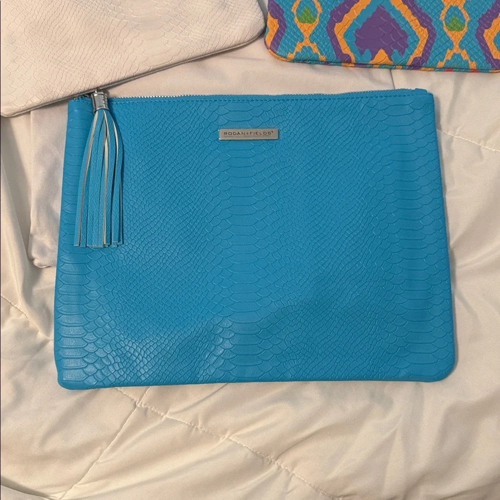 Rodan + Fields Clutch Set